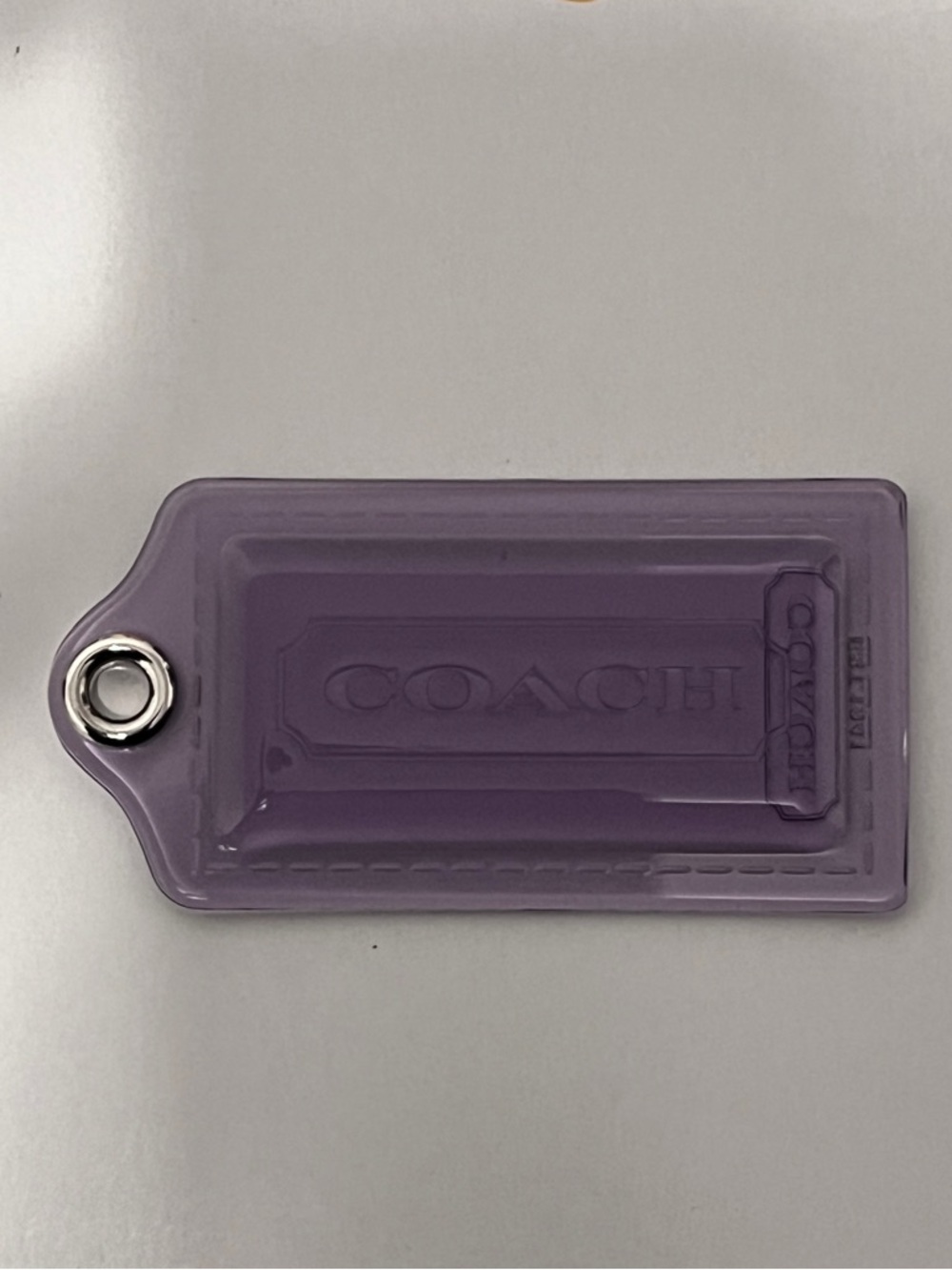 Coach Purple Hard Plastic Clear Coach Poppy Tag with Metal Eyelet